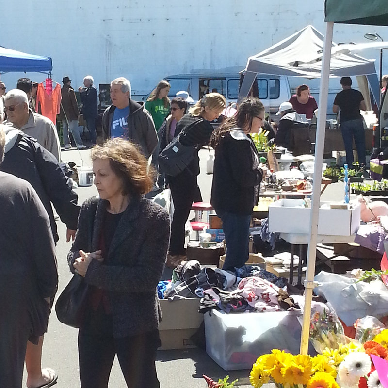 Children browsing second-hand toys.